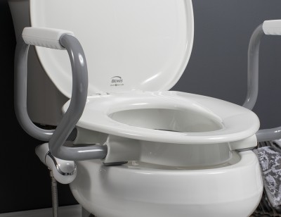 Assurance raised toilet seat with supportive arms and bidet attachment